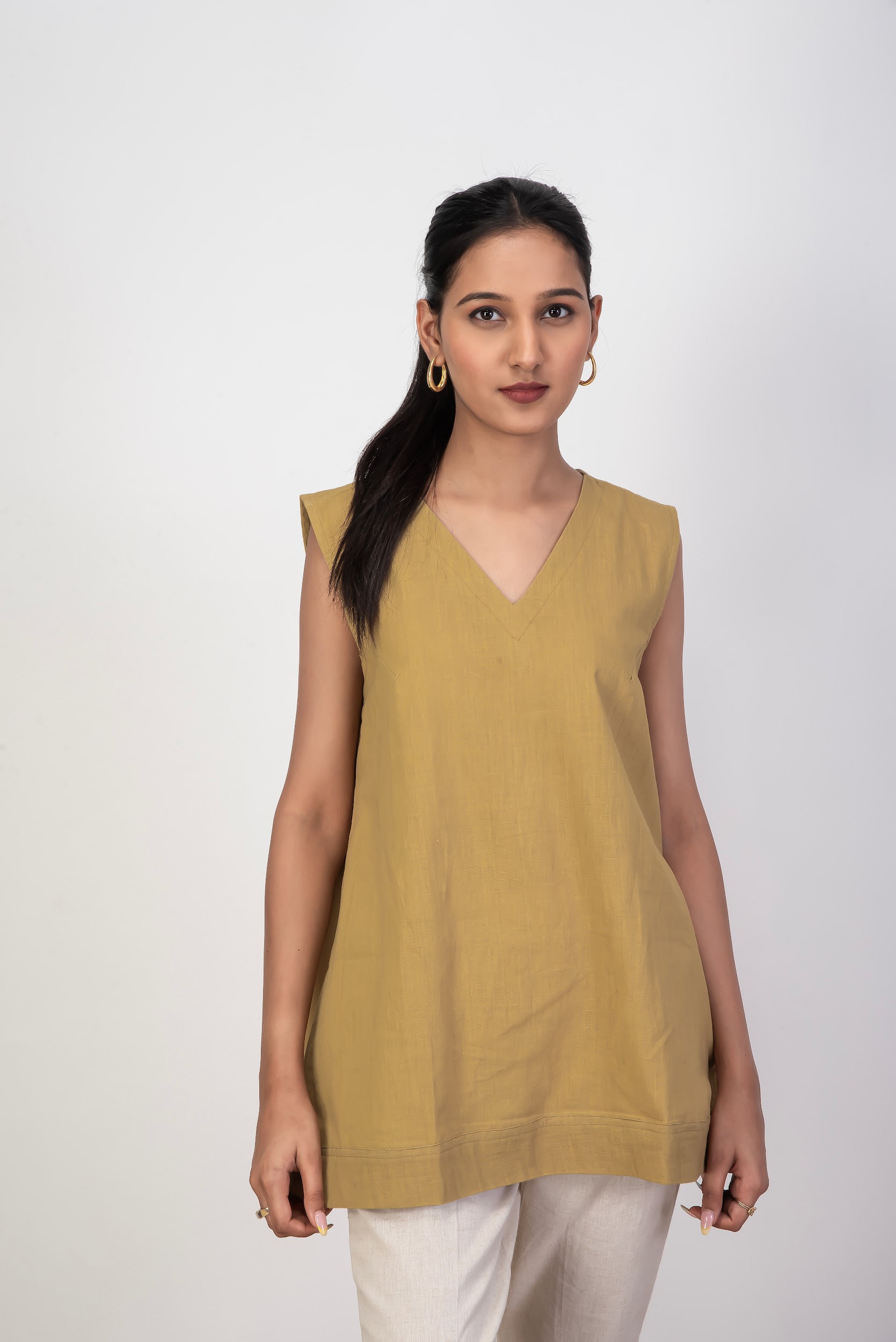 Handwoven Kala Cotton sleeveless top with Kolam hand embroidery in Pale Celery shade.