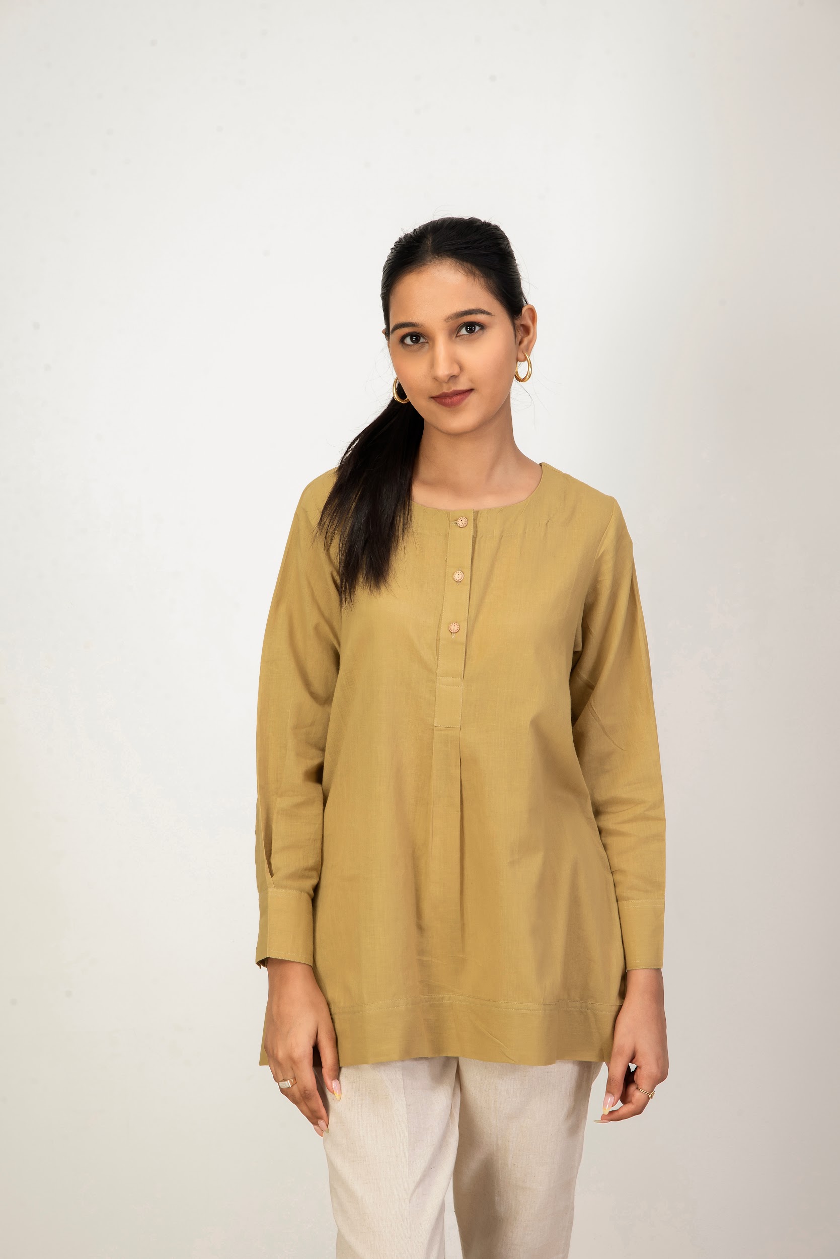 Naturally dyed Pale Celery handwoven cotton tunic kurta with round neck and 3/4 sleeves.